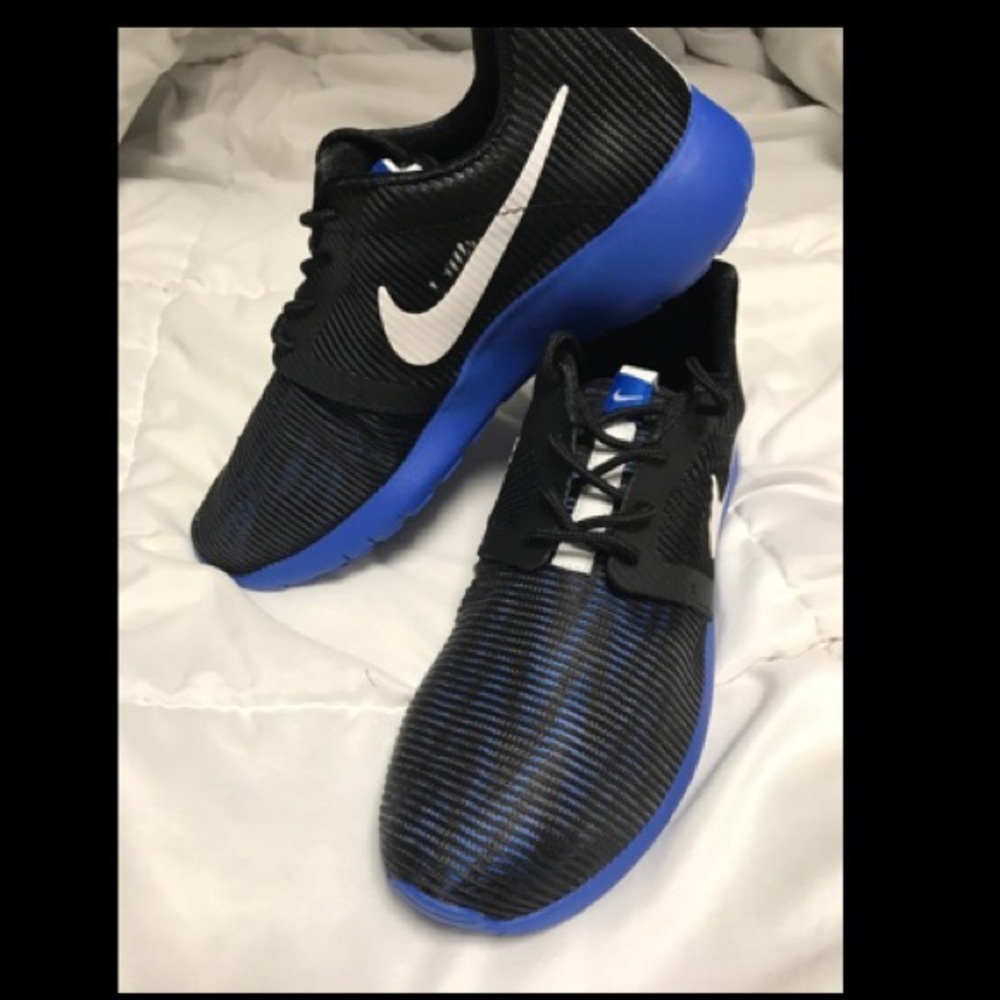 Nike blue/black/white athletic shoes. Brand New